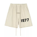 FEAR OF GOD FOG ESSENTIALS Flocked 1977 Casual 5‑Inch Summer Shorts